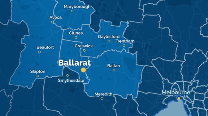A dark blue background map shows suburb of ballarat